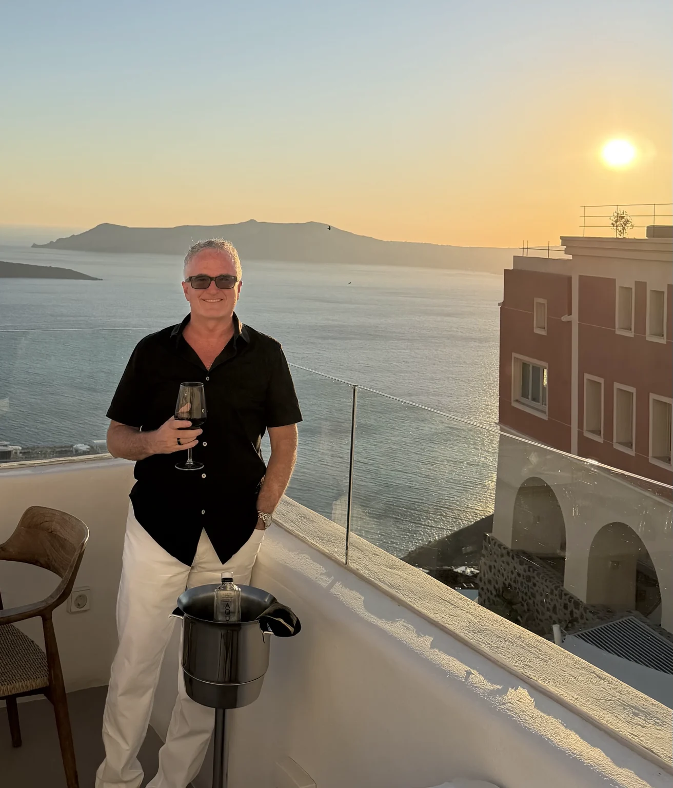 Dr. Jim Arnold at sunset overlooking the caldera in Santorini