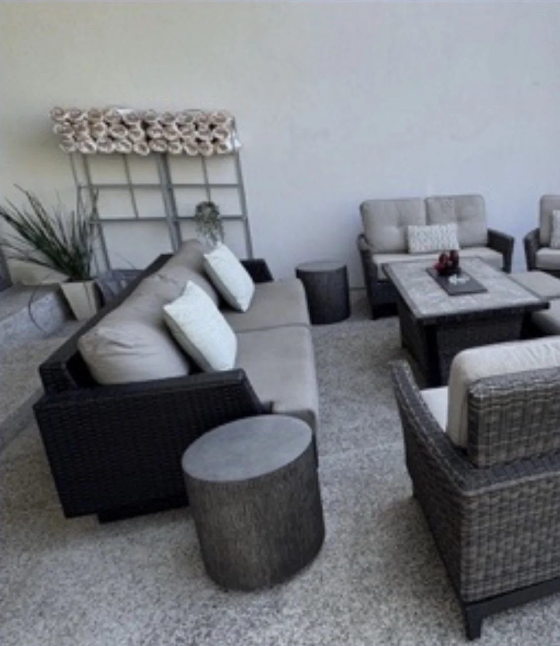 Poolside furniture with rolled towels