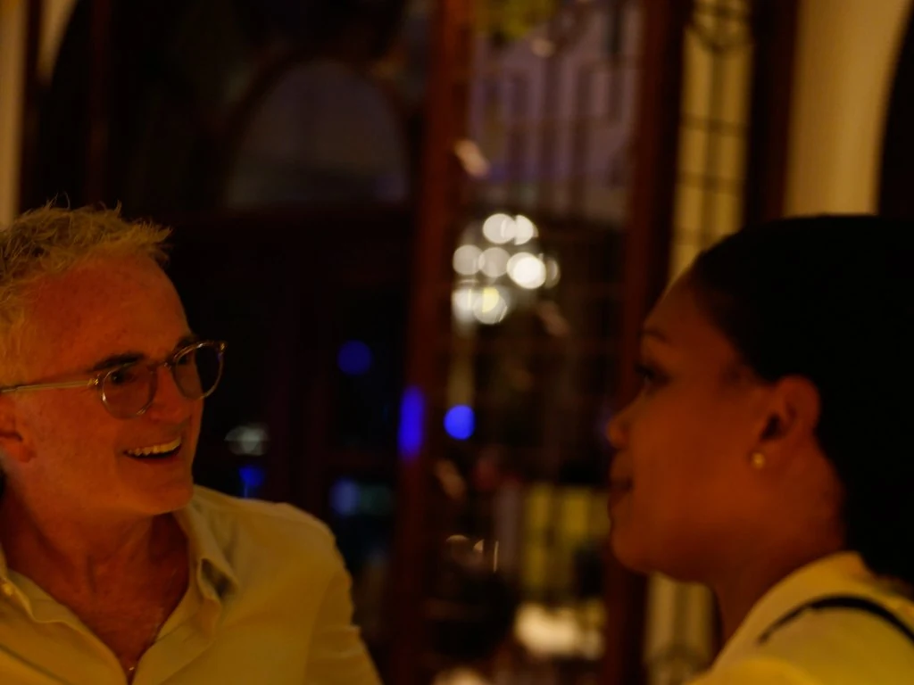 Two members in a direct one-to-one conversation about what they committed to